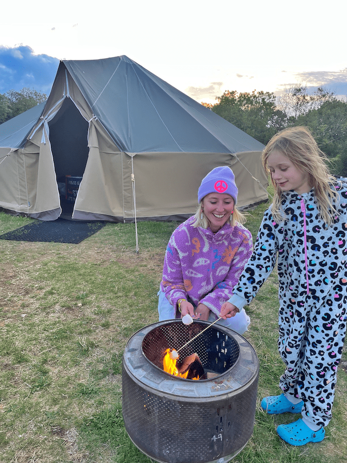 Firepit marshmallows outside nomadic bell tent at Mendip Basecamp