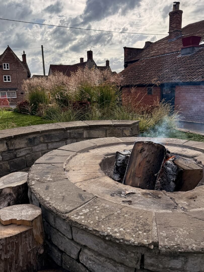 The Manor House Inn Ditcheat Somerset beer garden firepit